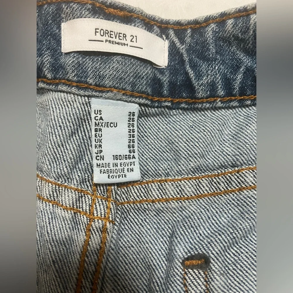 Forever 21 women's Blue Distressed Jean Shorts, size 26, New with out tags